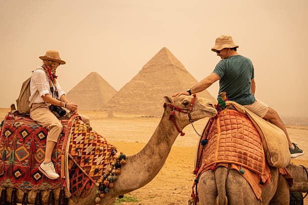 Camel Ride at the Giza Pyramids | Explore Egypt's Timeless Desert Gallery Image